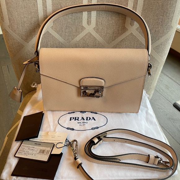 Prada Handbags - NWT Prada Multi Way Crossbody and Clutch and Satchel